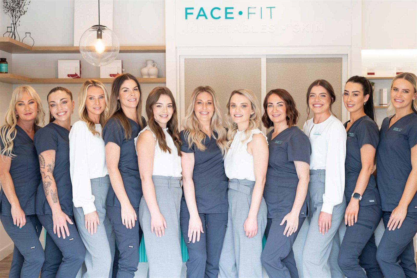 Group photo of the Face Fit team in the clinic