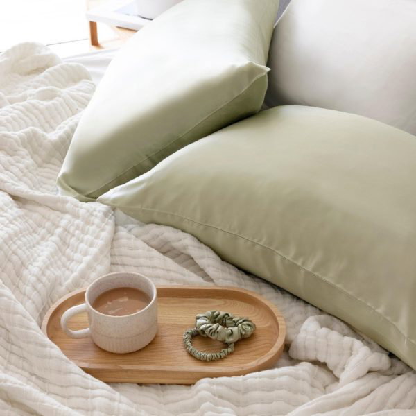 lunalux silk pillowcase sage green and tray with coffee and sage green silk scrunchies